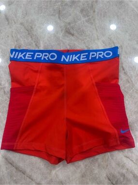 Women Nike Red Compression Shorts with Blue Waistband
